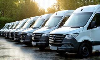 Row of clean business vehicles after Crystal Clear fleet wash